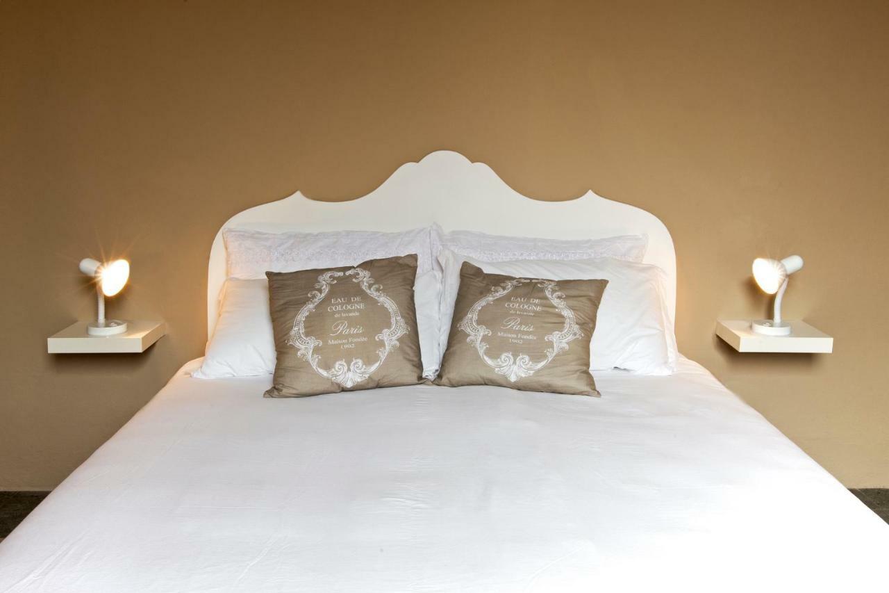 Blulassu City Center Rooms กาญารี ภายนอก รูปภาพ